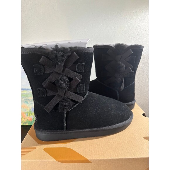 Embrace the cold season with Koolaburra's chic black winter and rain boots - Picture 1 of 9